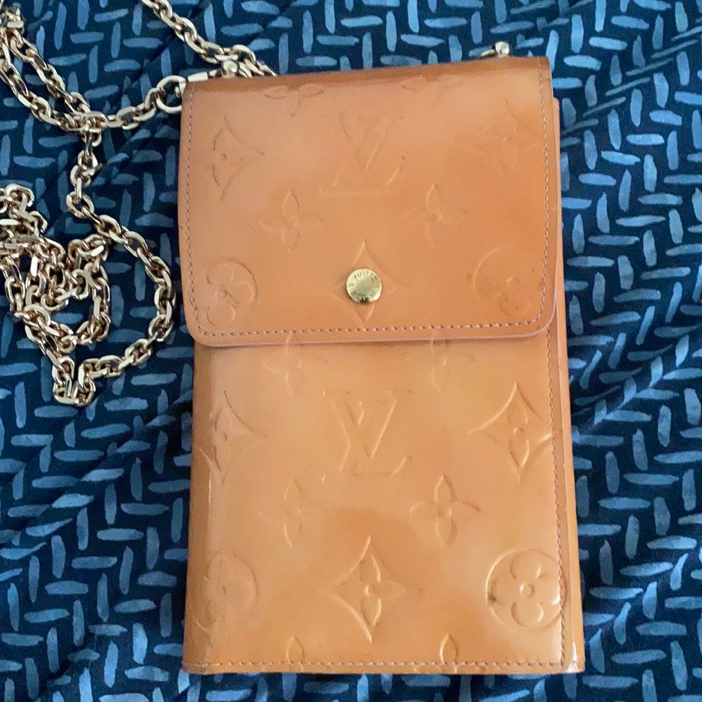 Louis Vuitton cross bag.